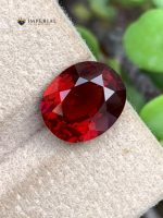 4.47 Ct AIG Certified Natural Malaya Garnet Oval Gemstone - Main View