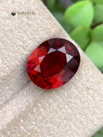 4.47 Ct AIG Certified Natural Malaya Garnet Oval Gemstone - Front View 1