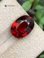 6.43 Ct AIG Certified Natural Malaya Garnet Oval Gemstone - Front View 1