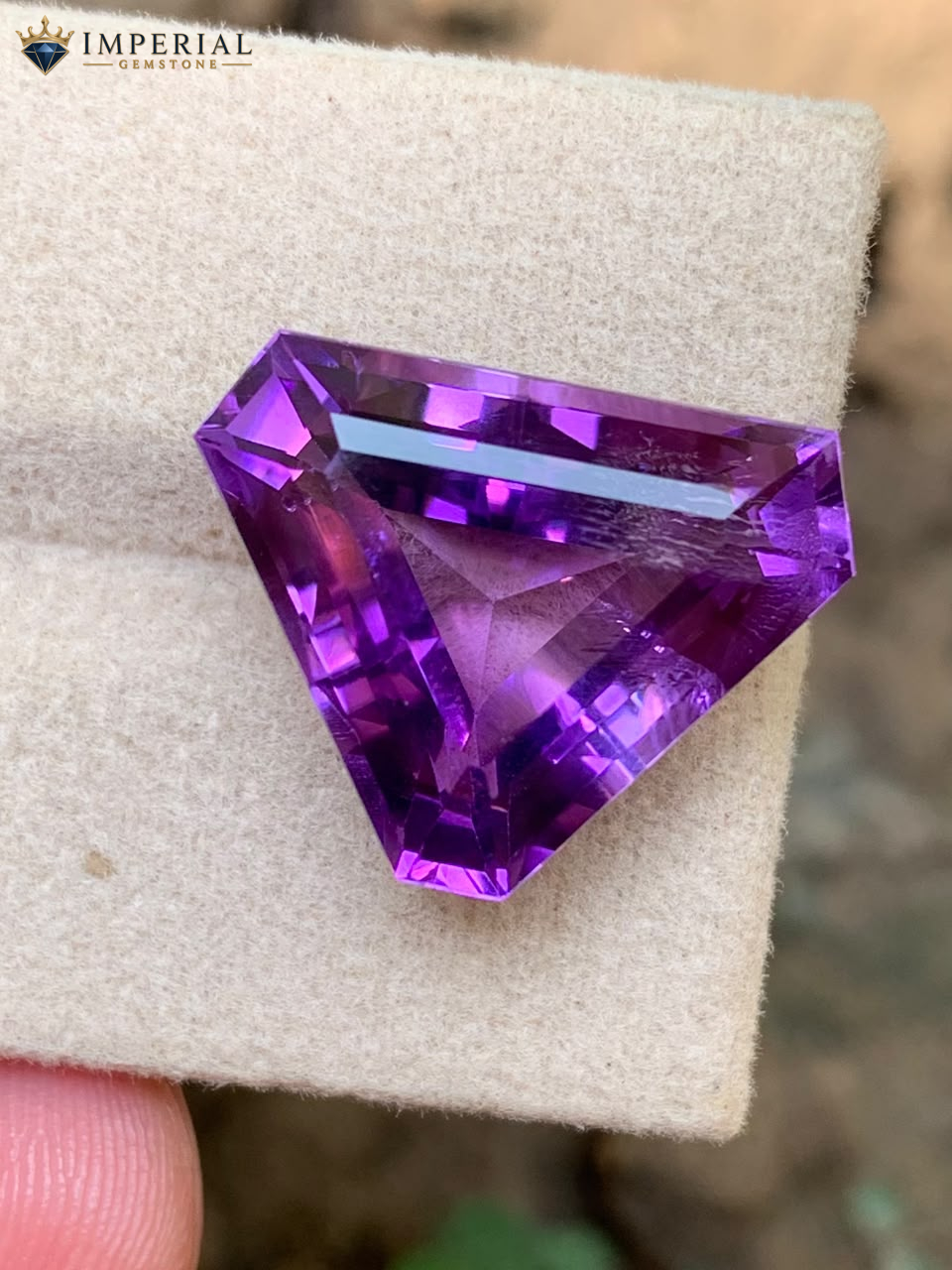 12.95 Carats Natural Amethyst Trillion Cut VVS2 from Brazil 12.95 Carats Natural Amethyst Trillion Cut VVS2 from Brazil